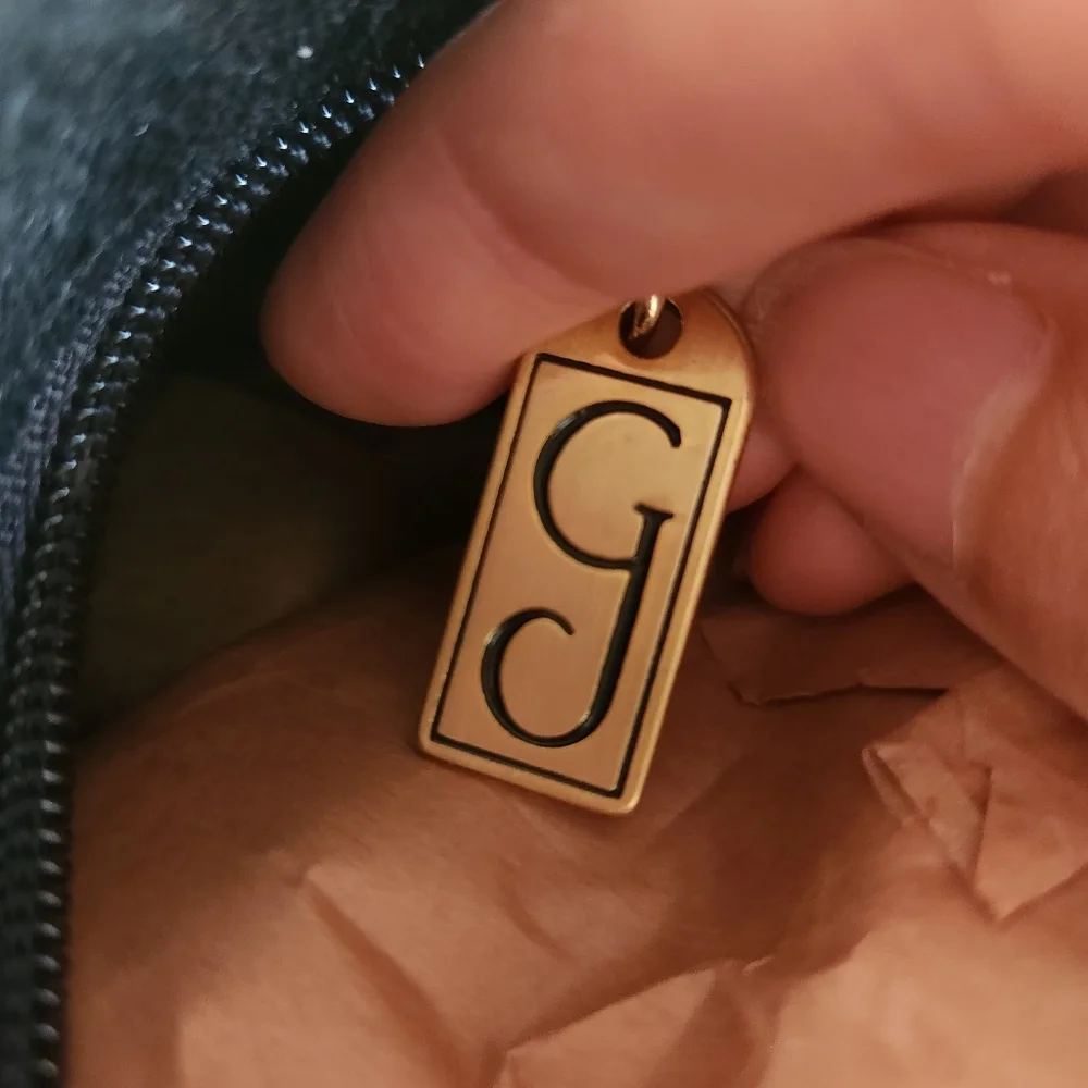 Ginnie Johansen Inc. outside bag